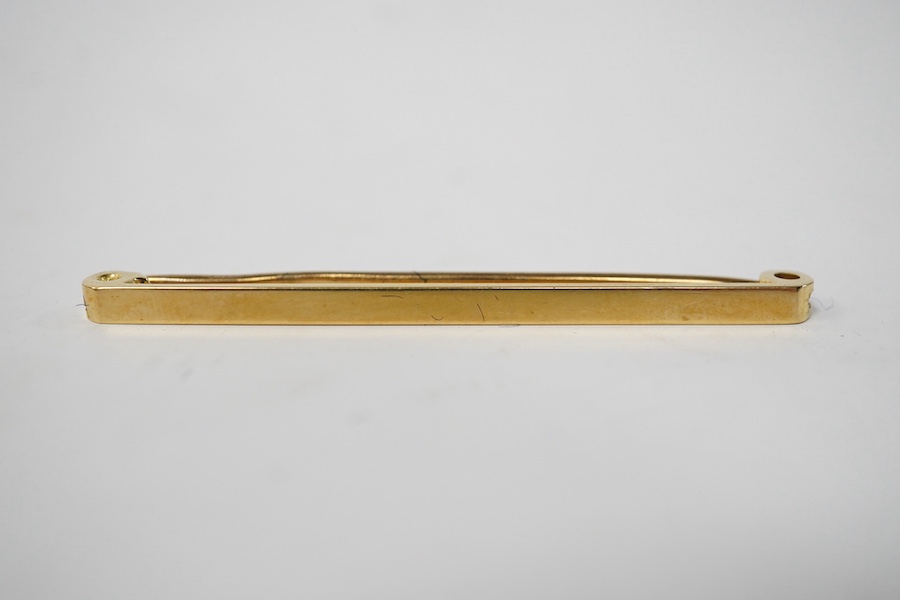 An 18ct tie pin, 51mm, 3.5 grams. Condition - fair to good